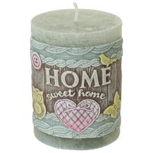 Sivá sviečka s dekoratívnym motívom 'HOME sweet home'.