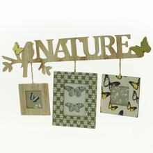 Fotorámik s nápisom NATURE a tromi rámikmi na fotografie.