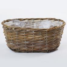 Prírodný oválny kôš s plastovou vložkou.