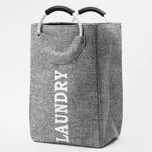 Textilná taška na prádlo s nápisom 'LAUNDRY'.