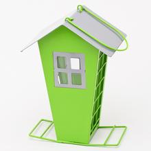 Zelené plechové krmítko pre vtáky.