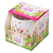 Veľkonočná sviečka v skle s tulipánovým dizajnom.