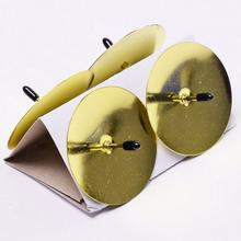 Zlaté bodce na vianočné dekorácie.