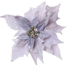 Umelá kvetina Poinsettia v lila farbe na klipe.