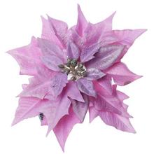 Ružová umelá kvetina poinsettia na klipe.