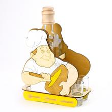 Darčeková sada s kuchárom a pohármi z dreva a skla.