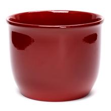 Jednofarebný keramický obal na kvety v bordovej farbe.