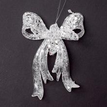 Priehľadná mašľa na zavesenie s trblietkami.