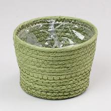 Zelený prútie obal s plastovou vložkou.