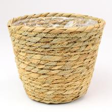 Hnedý obal z prútia s rozmermi D19xH15CM.