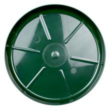 Zelená okrúhla miska pod kvetináč.