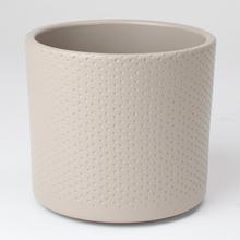 Okrúhly keramický obal Era s reliéfom v béžovej farbe.