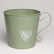 Kovový obal s uchom v tvare srdca, zelený.