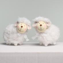 Biele ovečky na dekoráciu.