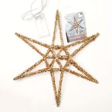 Zlatá vianočná hviezda s 20 LED svetlami.