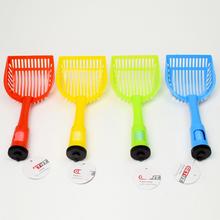 Lopatka na excrement v rôznych farbách.