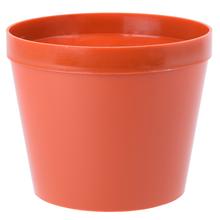 Kvetináč v terakotovej farbe s priemerom 23 cm.
