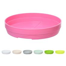 Ružová podmiska s okrúhlym tvarom na kvetináče.