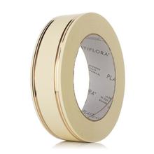 Smútočná stuha v krémovej farbe.