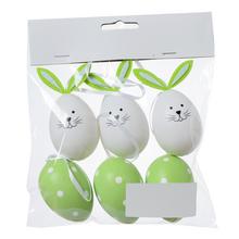Sada plastových vajíčok s motívom zajaca a bodkami.