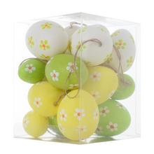 Závesné vajíčka v žltej, bielej a zelenej farbe s kvetinovým vzorom.