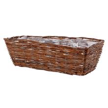 Hnedý prútený obal na kvety s plastovou vložkou.