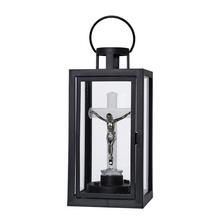 Čierna LED lucerna s krížom.