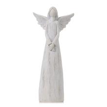 Biely dekoratívny anjel s krídlami.