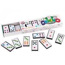 Klasické domino v krabičke s farebnými kameňmi.