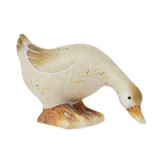 Keramická kačka bielej farby.