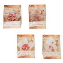 Figúrky zimných sobov v krabičke.