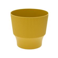 Okrúhly dizajnový obal na kvety v limetkovej farbe.