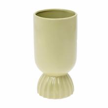 Zelený keramický obal na kvety s podstavcom.