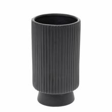 Čierny pruhovaný keramický obal na kvety.