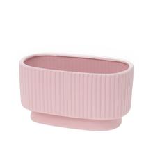 Ružový pruhovaný keramický obal v oválnom tvare.
