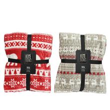 Vianočný prehoz s dvoma vzormi v červenej a šedej farbe.