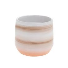 Obal na kvetináč Sunstone v jemných farbách.