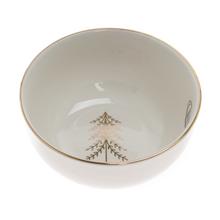 Biela porcelánová miska so stromovým vzorom a zlatým okrajom.