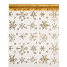 Organza v zlatej farbe s vianočnými motívmi.