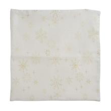 Obliečka na vankúš s krémovo-zlatým vzorom vločiek.