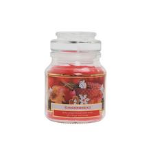 Sviečka s vôňou perníka v sklenenom obale.