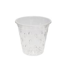 Priesvitný obal na orchideu s dekoratívnymi vzormi.