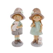 Detské figúrky chlapca a dievčaťa so psíkom.