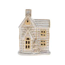 Porcelánový domček s LED osvetlením, biele a hnedé farby.