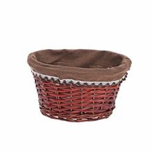 Oválny košík tmavo hnedý s látkovým vnútrom.