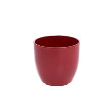 Obal na kvetiny v bordovej farbe s hladkým povrchom.