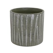 Zelený obal na kvetiny s textúrou.