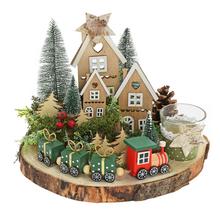 Vianočné aranžmá s drevenými domčekmi a vláčikom.