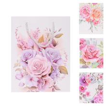 Darčeková taška s kvetinovým vzorom a glitrami.