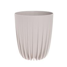 Bežový okrúhly kvetináč s vkladom.